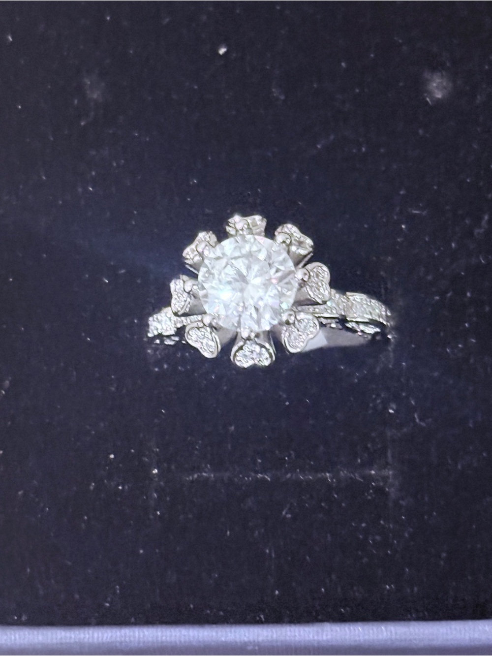 Elegant White Gold Floral Halo Engagement Ring with Clear Center Stone